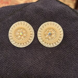 vintage disc clip on earrings. Plastic with moveable disc aurora borealis stones